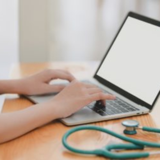 laptop near teal stethoscope in wooden table 3758756 400x250 1